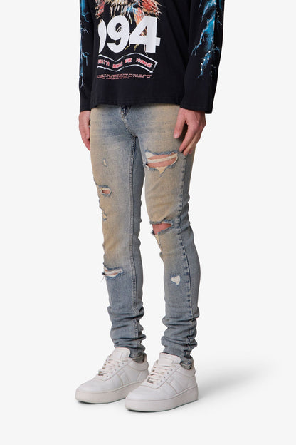 Slashed Skinny Denim - Vintage Blue