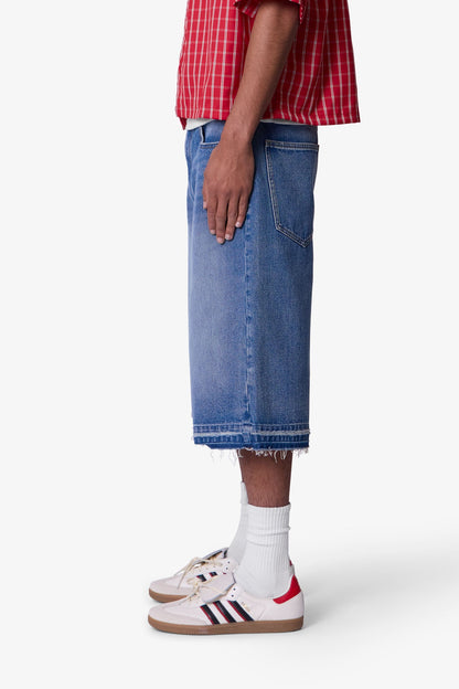 Ultra Baggy Raw Hem Denim Shorts - Washed Blue